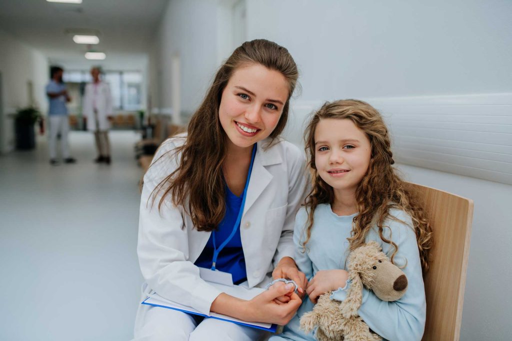 portrait-of-young-doctor-with-his-little-patient-a-2023-11-27-04-52-26-utc.jpg