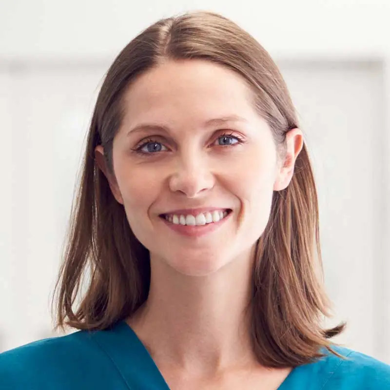 portraitss-of-smiling-female-doctor-wearing-scrubs-i-2023-11-27-04-56-26-utc.jpg